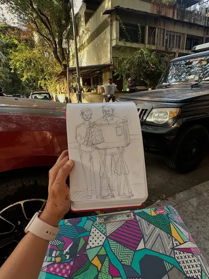 The first step in sketching Sanjay bhaiya's bhel puri stall. This pencil outline shows the process of observing and capturing the scene before adding color and life to the drawing.
