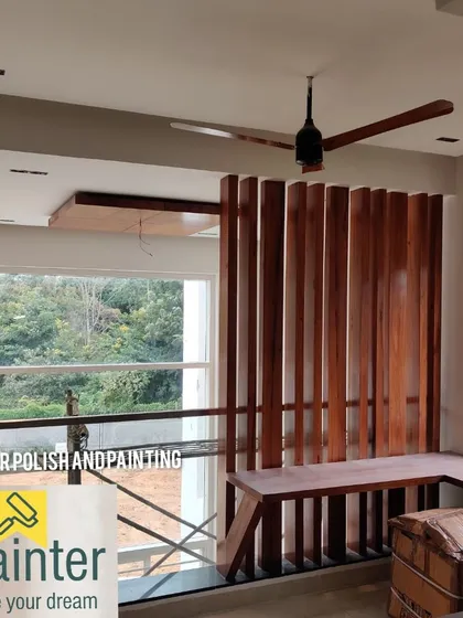 This wooden partition and seating area received a smooth, glossy polish. This type of finish is perfect for interior architectural elements, adding a touch of sophistication and reflecting light beautifully.