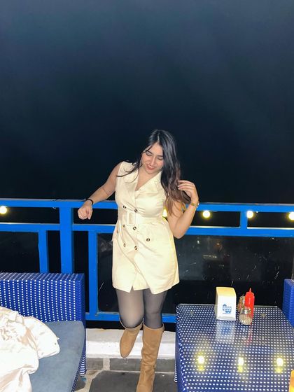 The same outfit without the jacket. This shows the versatility of the look and how it can be layered.