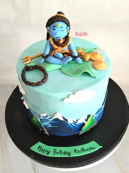 This Shiva-themed cake was for 2-year-old Aadhvan, a big devotee of Shiva. His family lovingly calls him "Panditji," and this cake, with a meditating Shiva figure, was a perfect tribute to his sweet devotion.