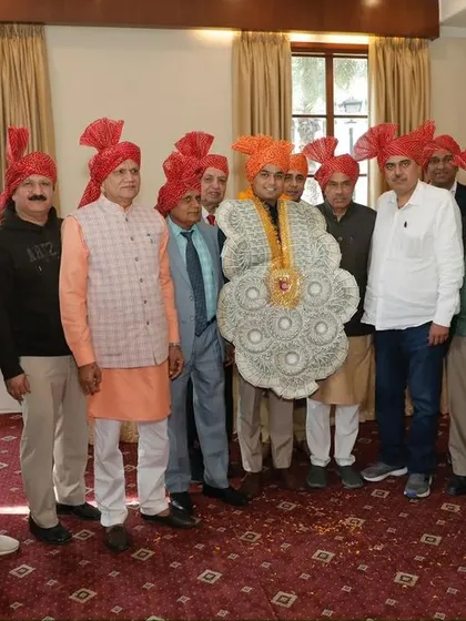 Being honored with a large garland of currency notes, a traditional sign of immense respect and blessing. I am humbled by this gesture.
