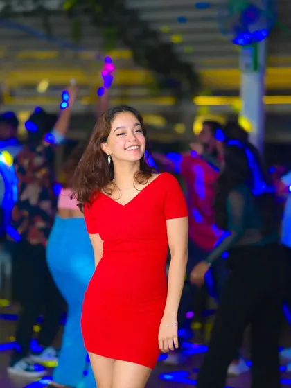 A happy guest enjoying the vibrant atmosphere at one of my weekend events. My focus is always on creating a fun and memorable night for everyone.