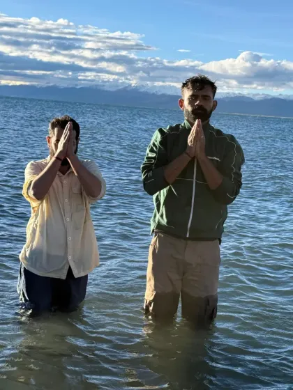 A sacred dip in the holy waters of Lake Mansarovar. With the snow-capped mountains as our witness, we immerse ourselves, an offering of devotion and a cleansing of the spirit.