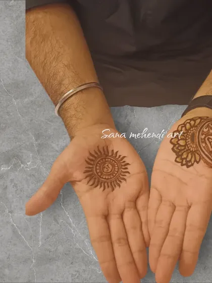 A simple yet powerful design for the groom, with a sun motif on one palm and initials on the other. A great choice for a minimalist look.