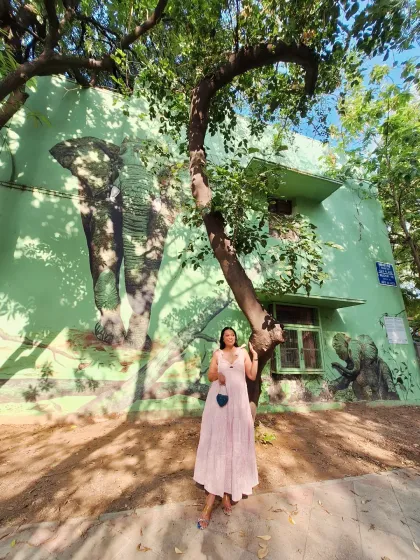 Fashion meets art at the Lodhi Art District. This tiered pink maxi dress creates a beautiful silhouette against the vibrant street art.