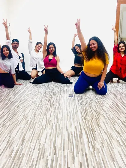 Victory poses after nailing the choreography at our weekend workshop. It's all about learning and having fun together.