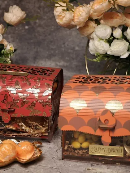 These laser-cut wooden chests are a great example of premium, reusable packaging that adds value to the gift.