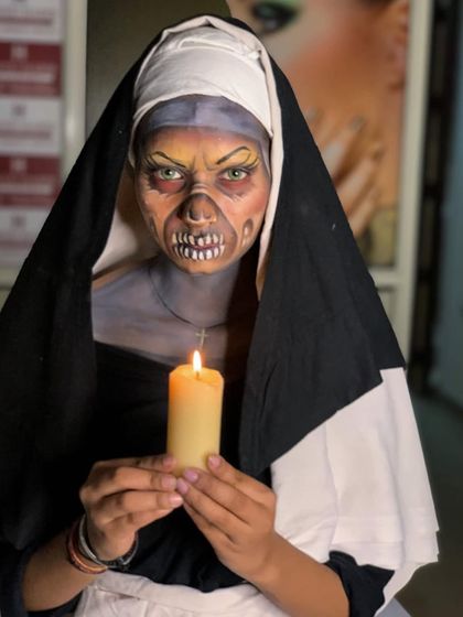 A student's work showcasing a spooky "Nun" character makeup for Halloween. This demonstrates the creativity and skill our students develop in our courses.