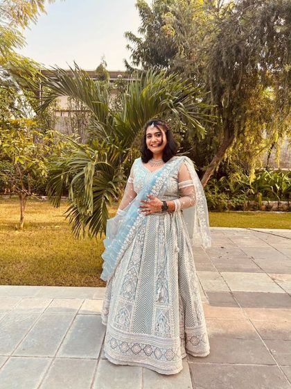 Another shot of the powder blue lehenga in an outdoor setting, showing how beautifully it photographs in natural light.