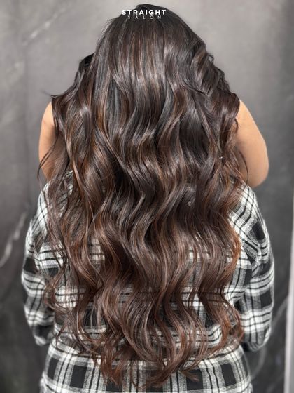 Glossy waves, goddess energy. A client showing off her voluminous, perfectly styled hair.