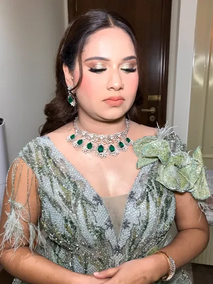 A close-up on the eyes, showing the beautiful blend of green and gold shimmer.