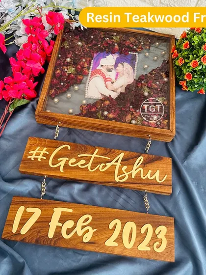 A full view of the frame with its hanging wooden plaques, perfect for a personalized home entrance.