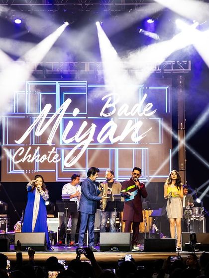 The entire band on stage, a true spectacle of lights and sound. This is what a full-scale Bollywood live band looks like.