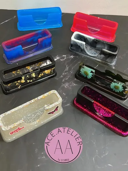A collection of my exquisite resin cardholders. Each one is a unique piece of art, perfect for your office desk or as a bulk corporate gift.