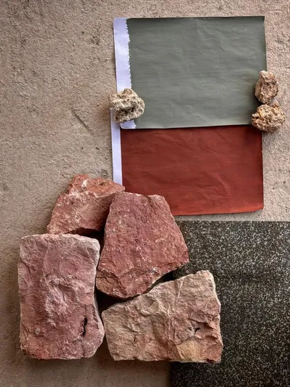 A material palette for the Kizikula project. We combine samples of the local red stone, granite, and custom color swatches to ensure all the elements of the design will work together harmoniously.