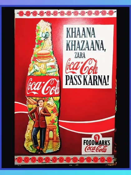 This Coca-Cola poster, 'Khaana Khazaana, Zara Coca-Cola Paas Karna!', blends filmi style with brand messaging for a memorable advertisement.