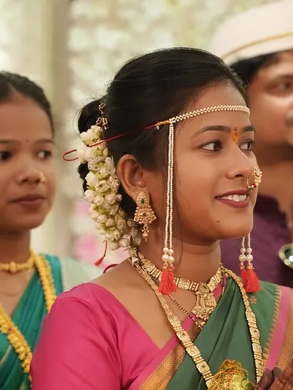 A candid shot of a bride during her wedding rituals. My makeup style focuses on a natural glow that looks beautiful in any lighting, ensuring you look your best in every photo.