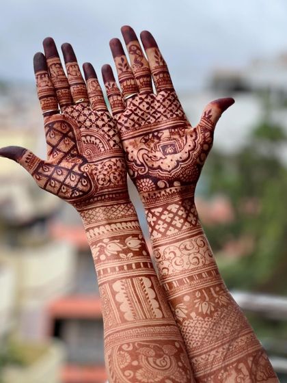 The full two-arm view of the bridal design, showing the beautiful stain and intricate details.