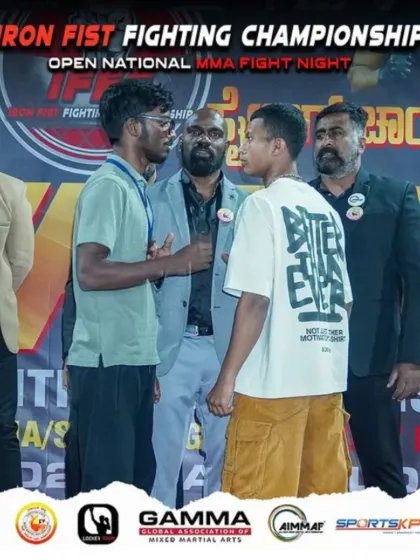 The calm before the storm. One of our fighters, Dhanush, in an intense face-off before his bout at the Iron Fist Fighting Championship. This is where the mental battle begins.