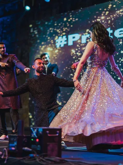 The best moments are when the dance is filled with pure, unscripted emotion. This groom's playful dip during their group performance became one of the most memorable parts of the night.