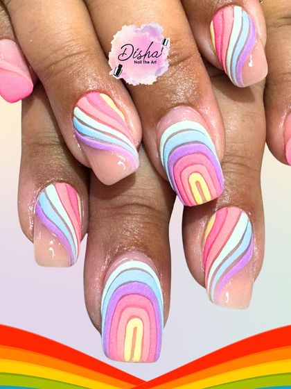 Wear a rainbow on your fingertips. This cheerful design features hand-painted rainbow arches, creating a colorful and happy vibe that's perfect for brightening any day.