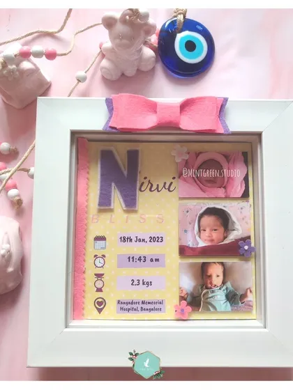 Welcome a little one with a personalized newborn announcement frame. This keepsake box frame captures all the precious details: their name, birth date, time, and weight, alongside their first sweet photos. It's a gift the new parents will cherish forever.