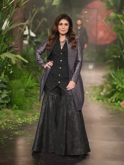 A model walks the forest path runway I designed for Kunal Rawal. The floor was scattered with leaves and organic materials to complete the illusion of an enchanted woodland.