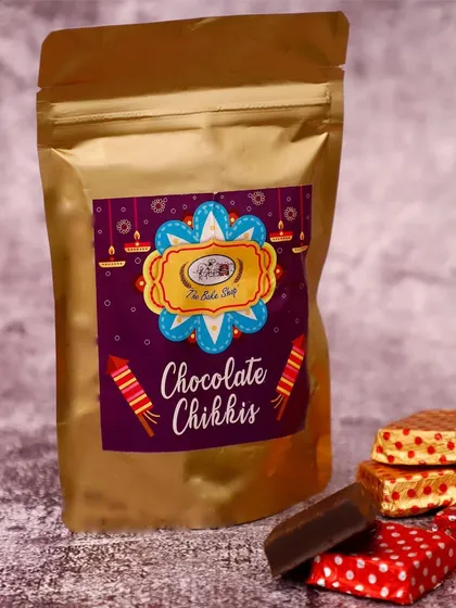Our Diwali special Chocolate Chikkis are a modern take on a traditional favorite. The crunchy peanut and jaggery brittle is coated in rich chocolate, making it an irresistible festive snack.