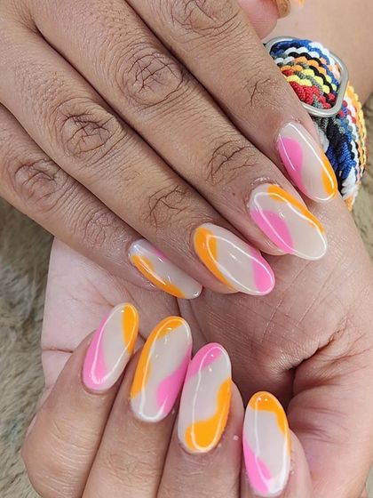 A playful and abstract design using negative space. Swirls of neon pink and orange create a fun, lava-lamp effect on a neutral base, perfect for a pop of color.