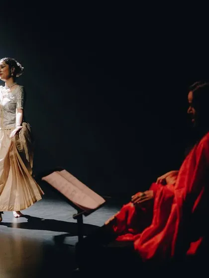 Performing in 'Mandala', a collaboration with musician Chandana Bala Kalyan. The interplay of light, music, and movement is central to this piece, creating a stark yet powerful atmosphere to explore poetry and spirituality.