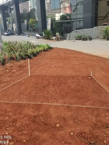 Testing the first of five sculpted mounds. This iterative, on-site process is crucial to achieving the right form and feel for the landscape.