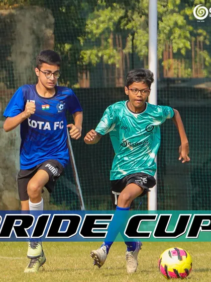 An action shot from the Pride Cup match between GSC and KOTA FC, showing players competing for the ball.