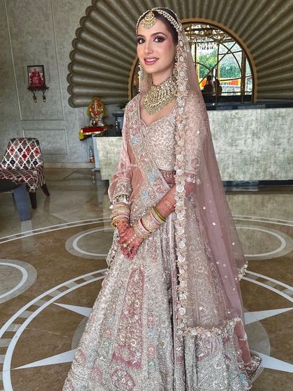 A happy bride on her big day. Her smile says it all, and her radiant makeup enhances her joy, proving that the right makeup can make you feel incredible.