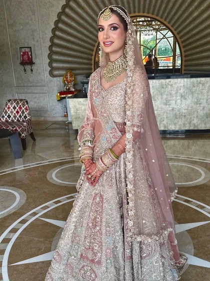 A happy bride on her big day. Her smile says it all, and her radiant makeup enhances her joy, proving that the right makeup can make you feel incredible.
