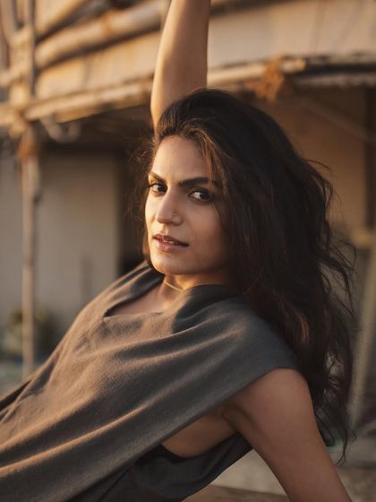 A tighter version of the previous pose, focusing more on the subject's intense and engaging expression.