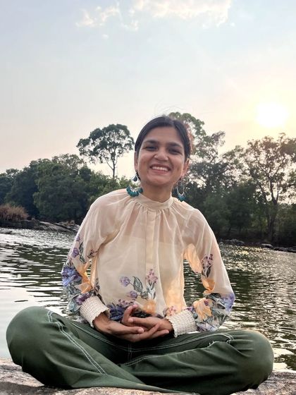 A smile after a moment of deep thought by the water. My travels often lead to personal insights that I share through my art and writing.