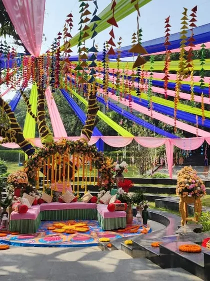 A vibrant and joyful Mehendi setup at the Hridayesh Resort in Jim Corbett. I love playing with bold colors, traditional patterns, and lush florals to create an energetic and festive atmosphere for pre-wedding celebrations.