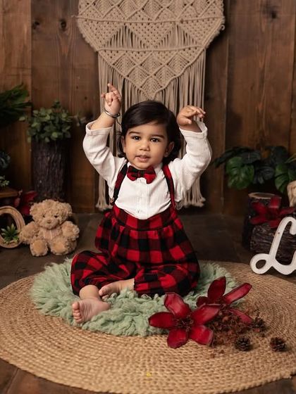 Look at those dance moves! This playful shot perfectly captures the fun and energy of a toddler photoshoot. I always encourage them to be themselves and have a good time.