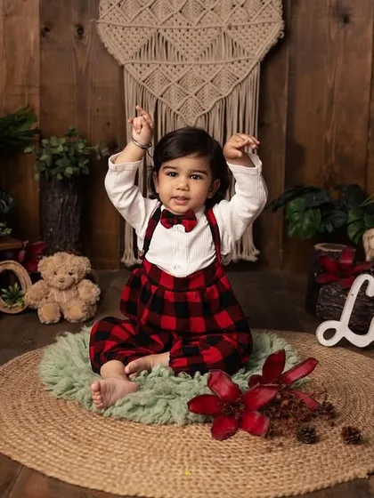 Look at those dance moves! This playful shot perfectly captures the fun and energy of a toddler photoshoot. I always encourage them to be themselves and have a good time.