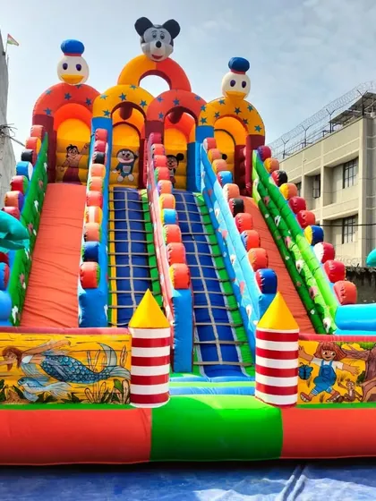This 4-slider bouncy features detailed underwater and jungle-themed artwork on the front panels. The bright colors and multiple activities make it a favorite for kids.