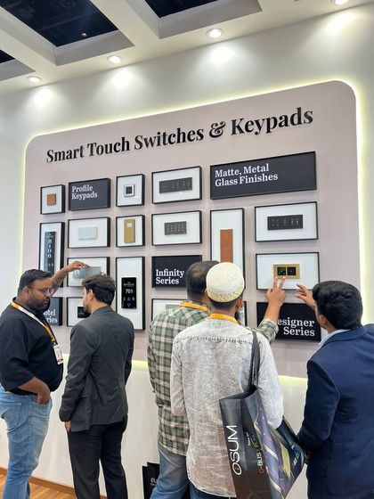 Visitors getting hands-on with our Designer and Infinity series switches at the Smart Home Expo. Feeling the quality and responsiveness is key to understanding our products.