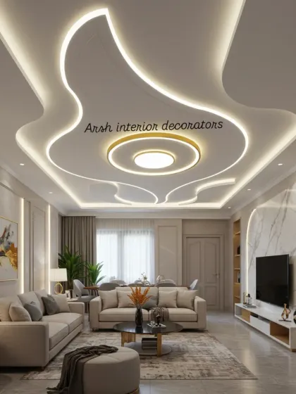 This is the kind of grand statement a living room deserves. I designed this flowing, multi-layered false ceiling with integrated cove lighting to create a luxurious and spacious feel, making it the centerpiece of the entire home.