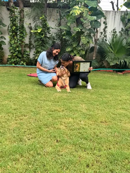 A sweet kiss for Milly on her graduation day. These moments are what make all the hard work worth it.
