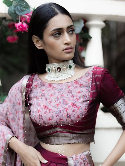 This brick maroon Mangalagiri silk lehenga offers a sophisticated and earthy elegance. The printed blouse and georgette dupatta create a soft, layered look.