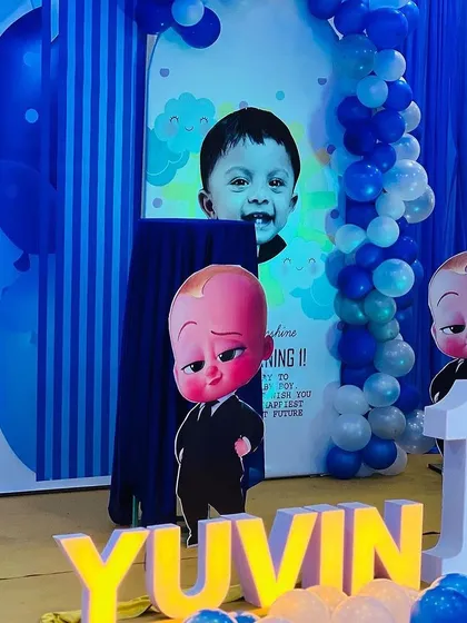 A detailed shot of the Boss Baby setup, focusing on the character cutouts, the personalized backdrop, and the light-up name display.