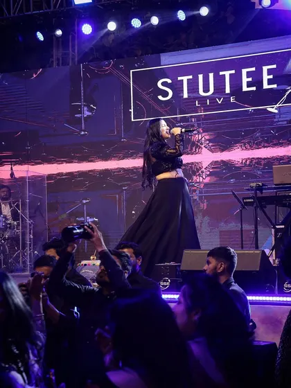 Here I am with my full band, delivering a high-energy performance for a private club event. With professional sound and lighting, we transform any venue into a full-fledged concert, ensuring an electrifying night for everyone.
