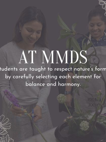 Two students work together, learning to respect nature's forms. They are carefully selecting each element for balance and harmony, a core principle of Ikebana.