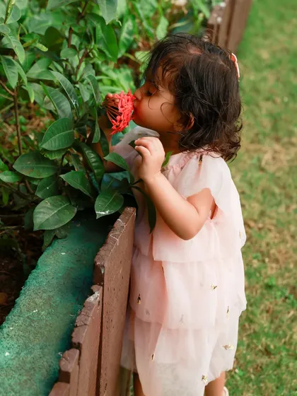 Sometimes you just have to stop and smell the flowers. I love capturing a child's natural curiosity and wonder during our outdoor photoshoots.