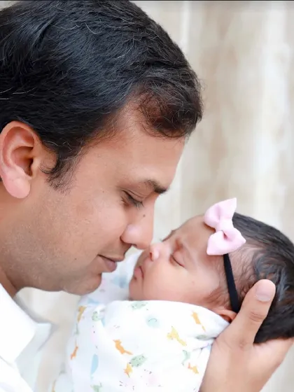 The special bond between a father and his newborn daughter. These are the quiet, heartfelt moments we aim to preserve forever.