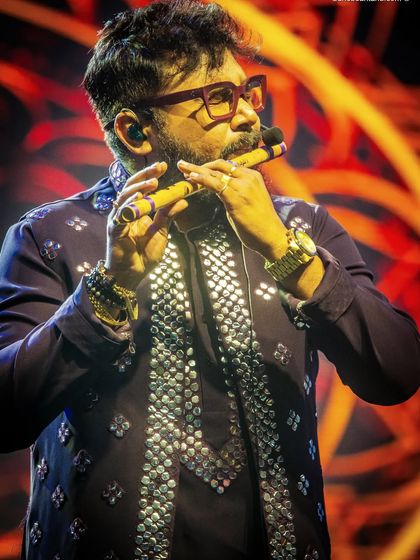 The soulful sound of the flute, captured in a close-up shot that highlights the emotion of the player.